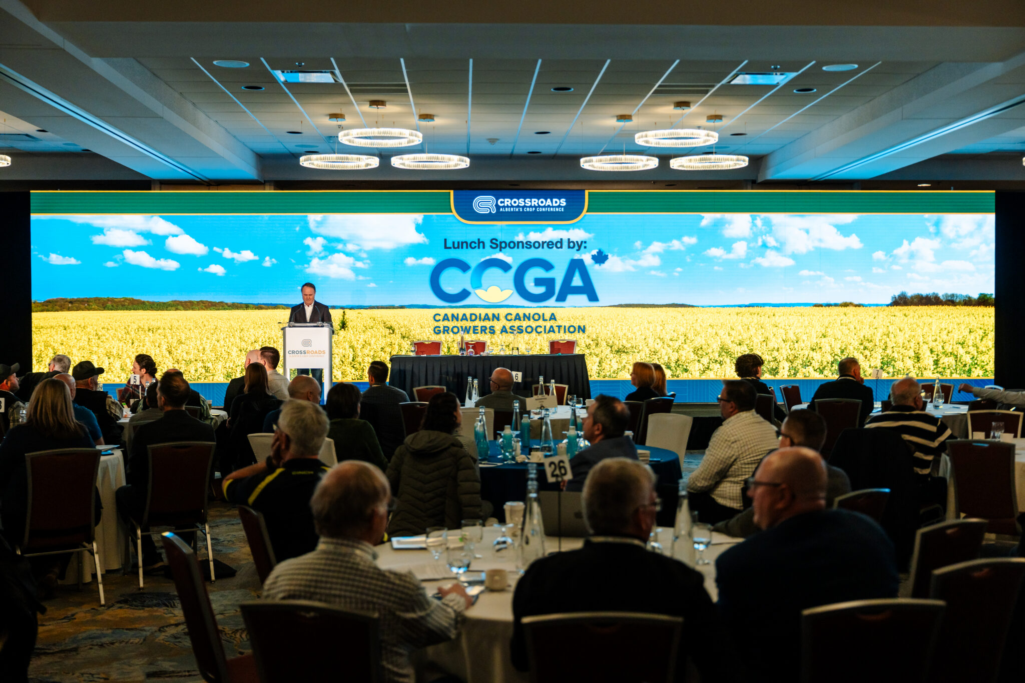 CrossRoads Crop Conference at DoubleTree by Hilton West Edmonton featuring a 50-foot-wide LED video wall backdrop and conference AV production by Kiwi Productions.